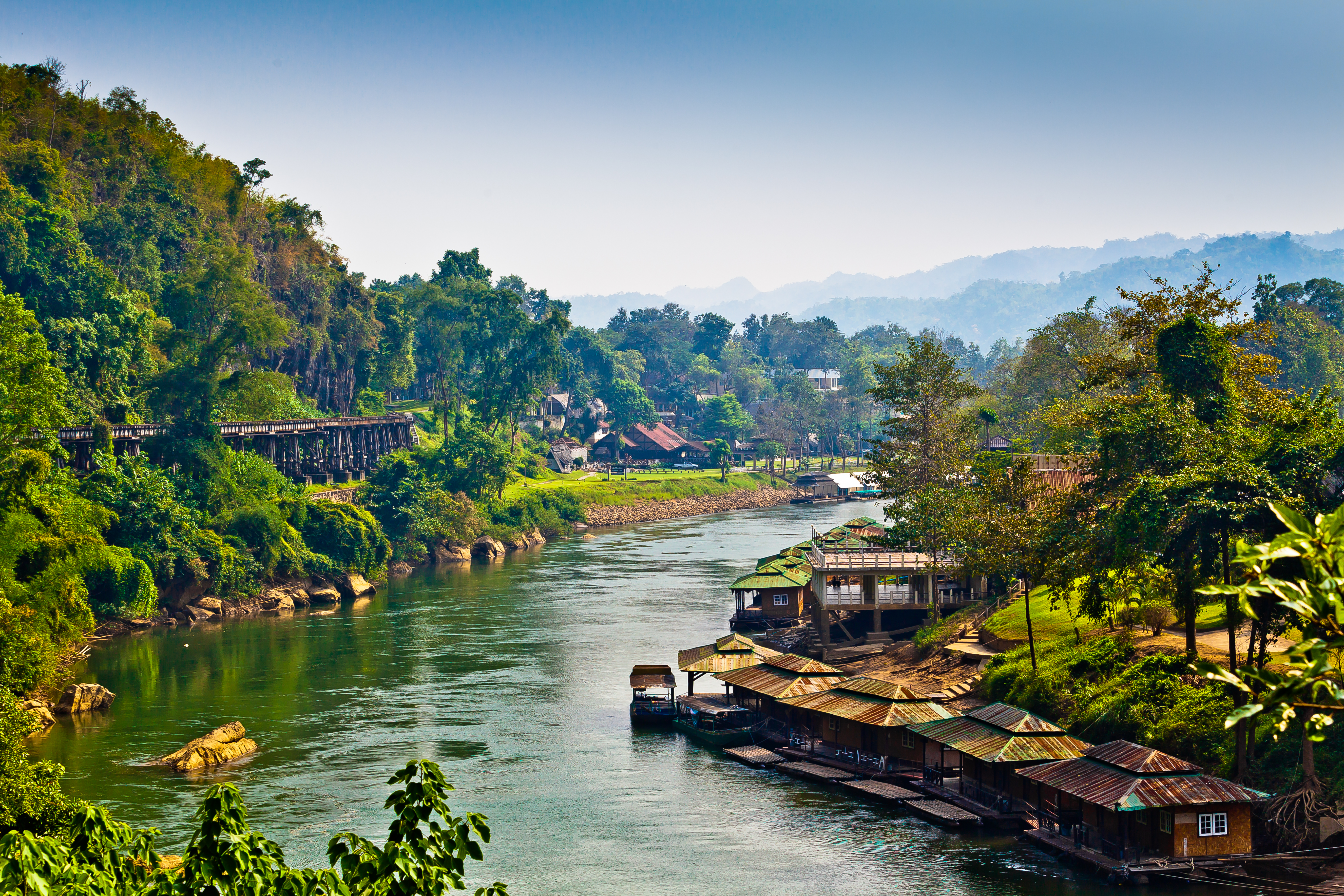 River winds between rural villages