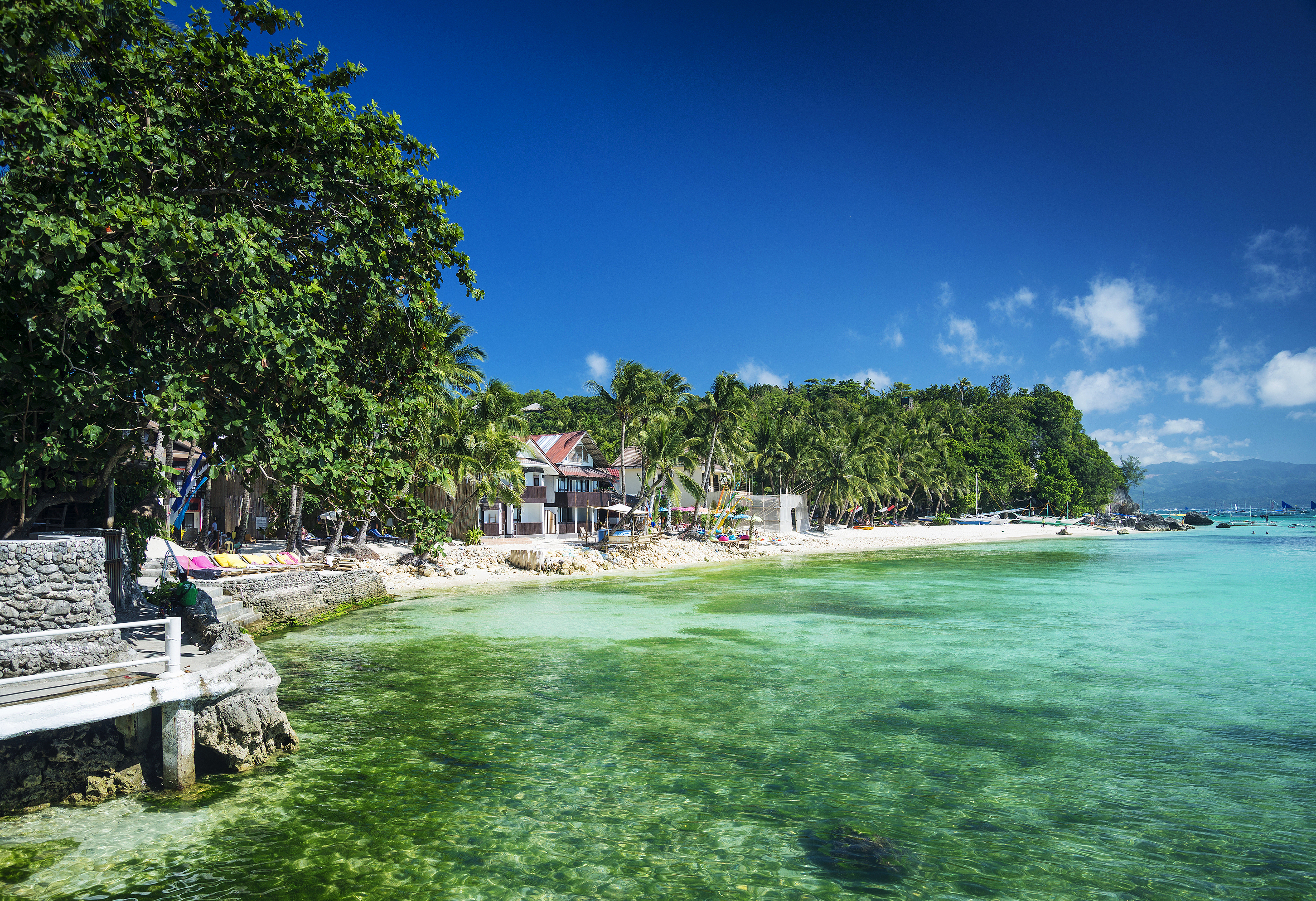 Beach in tropical paradise with stunning emerald waters