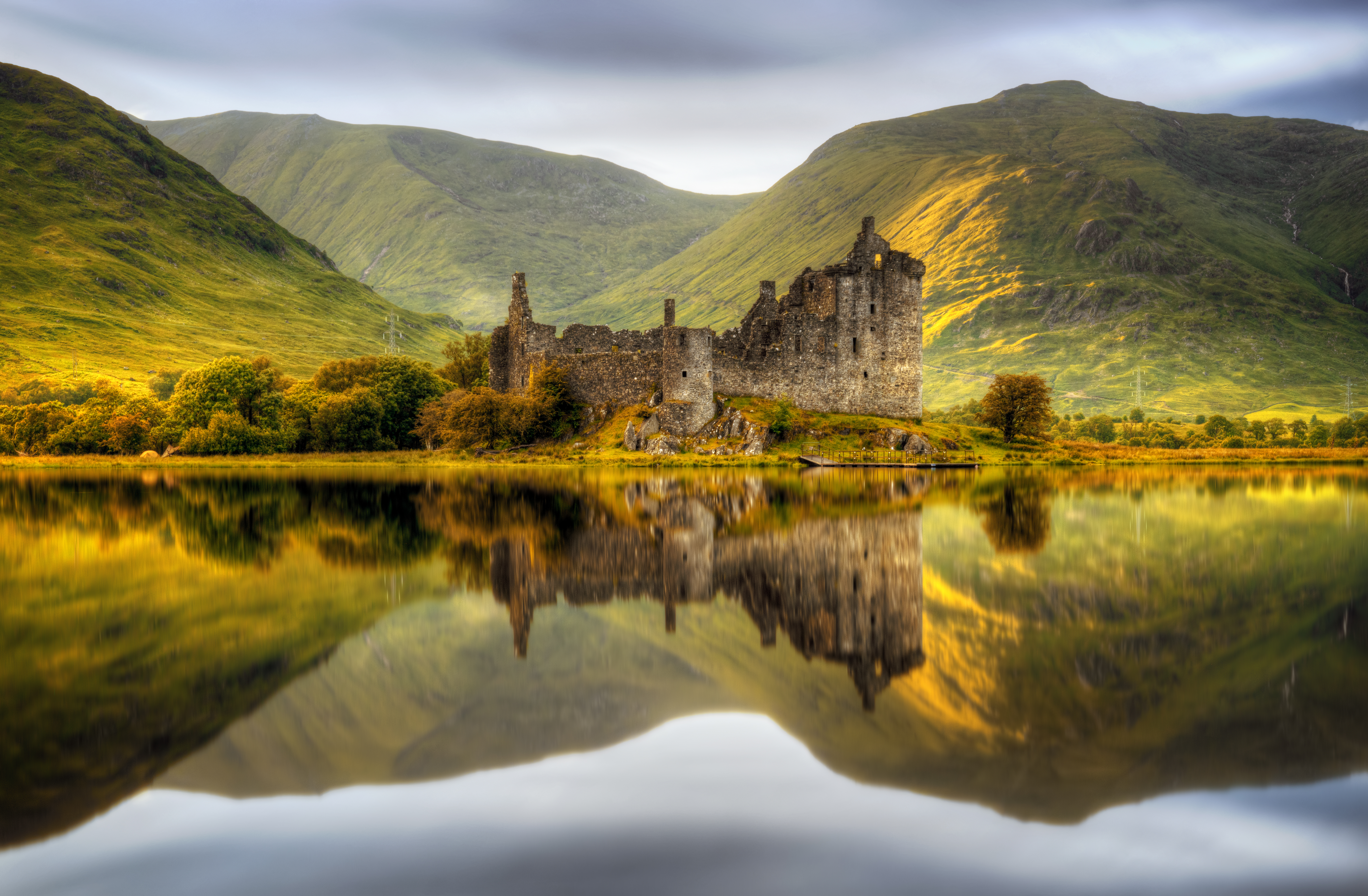 Reflections in Loch Awe at sunset of Kilchurn Castle, Scotland