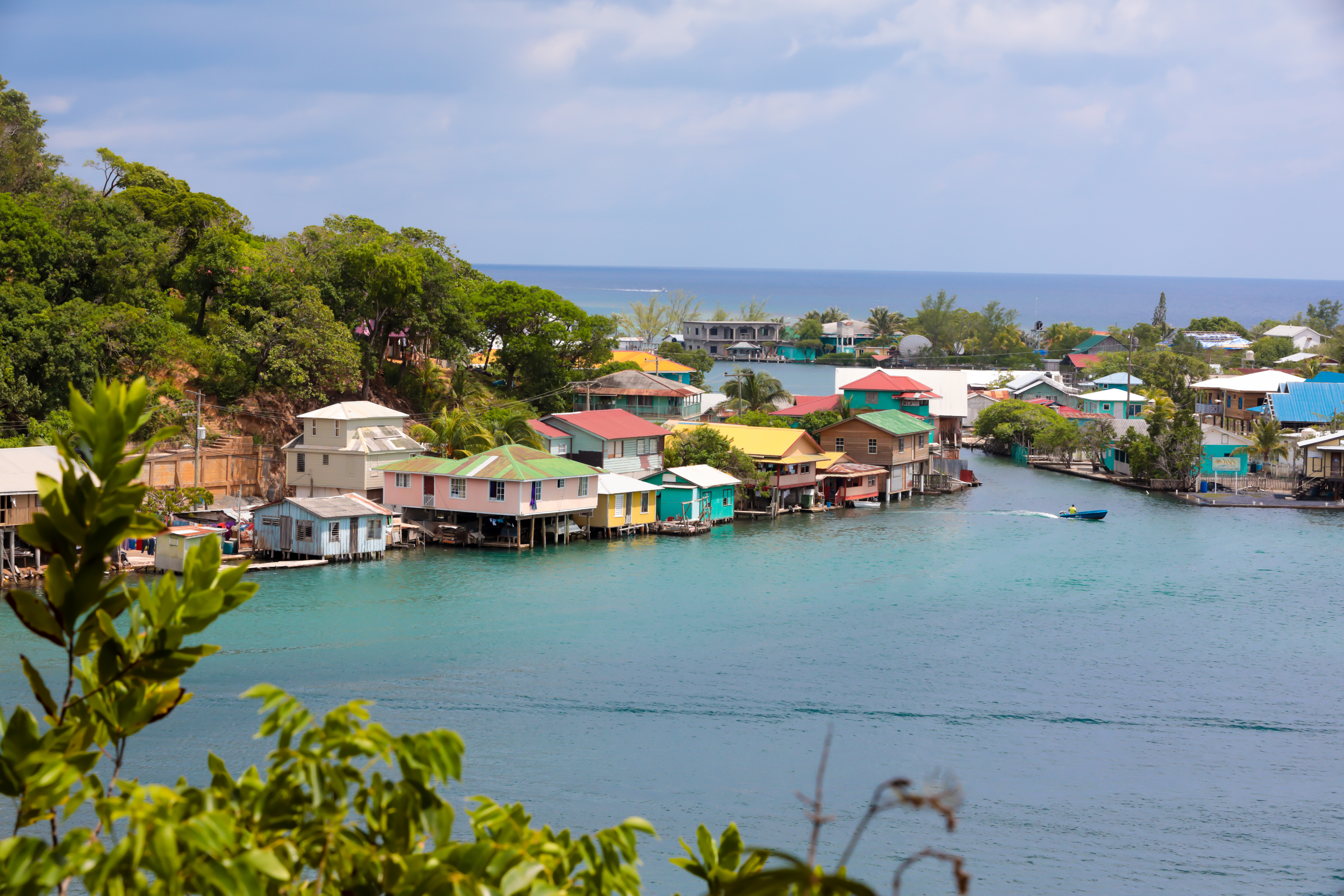 Colorful wooden stilt homes located at a seaside village on Roatain, which is part of the Bay Islands of Hondouras