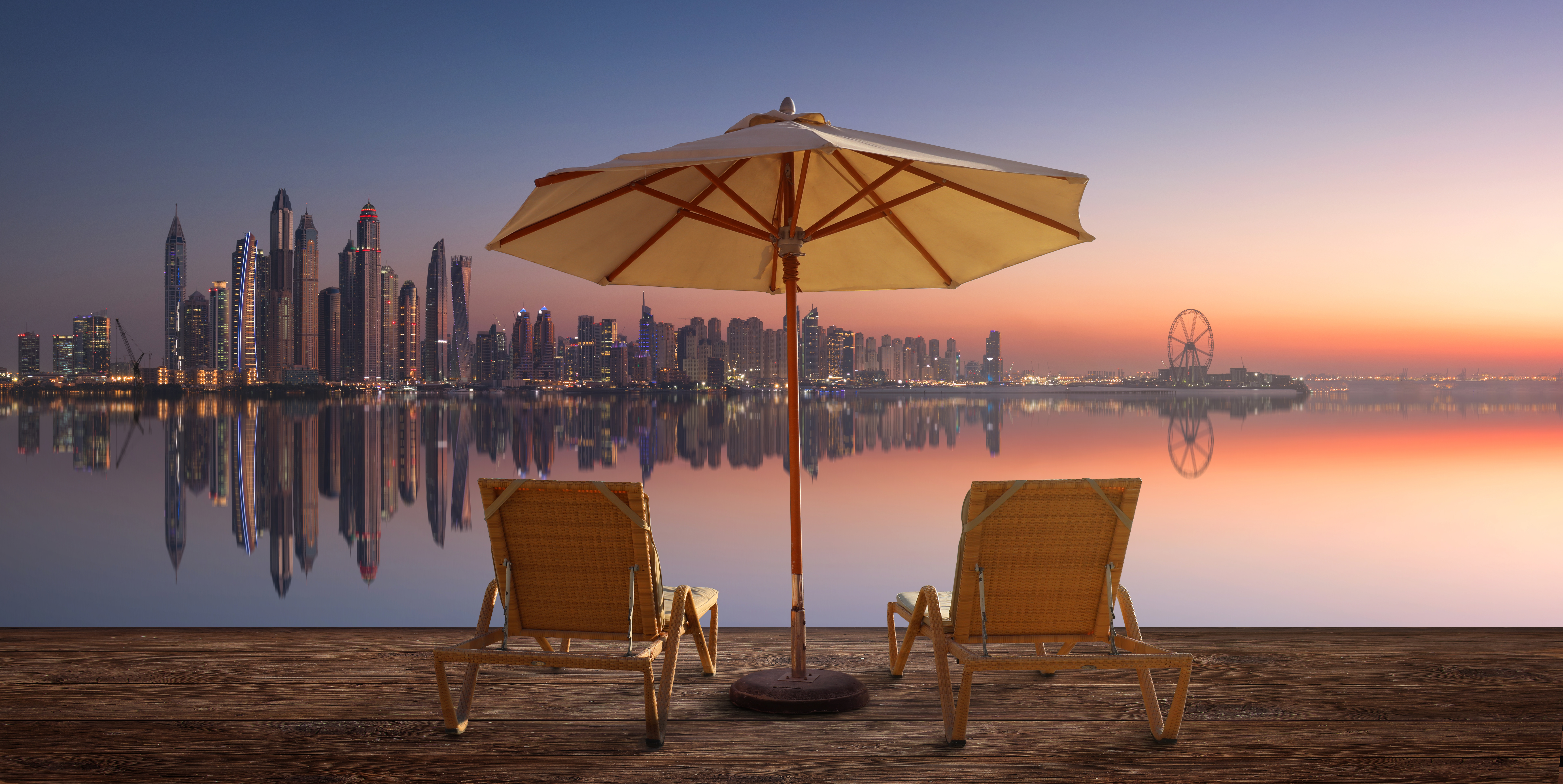 Beautiful beach in Dubai with the skyline of Dubai Marina on the horizon