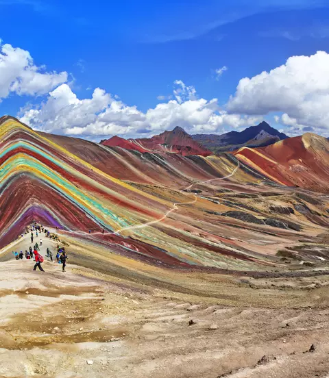 Vinicunca, also known as Winikunka or Rainbow Mountain, with colorful stripes made up of layers of 14 different minerals. 