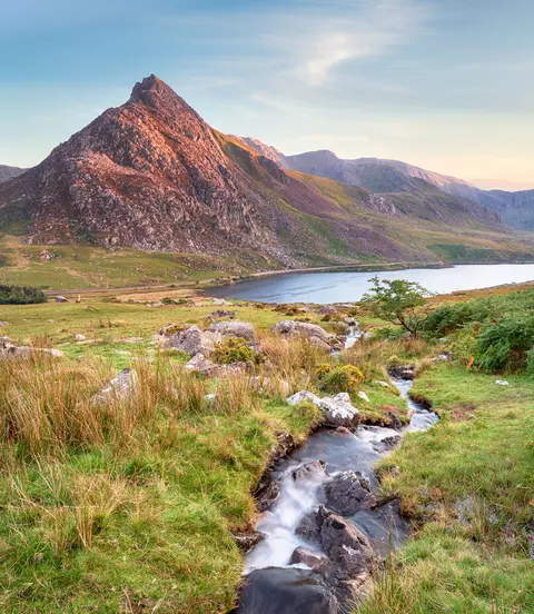 Evening light on Mount Tryfan above Llyn Ogwen in Snowdonia National Park in Wales