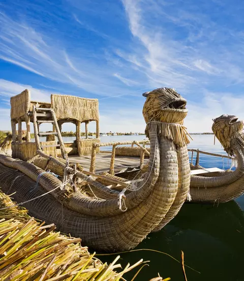 Reed boats moored on the coastline