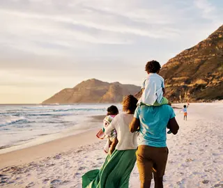 Family of 4 on beach