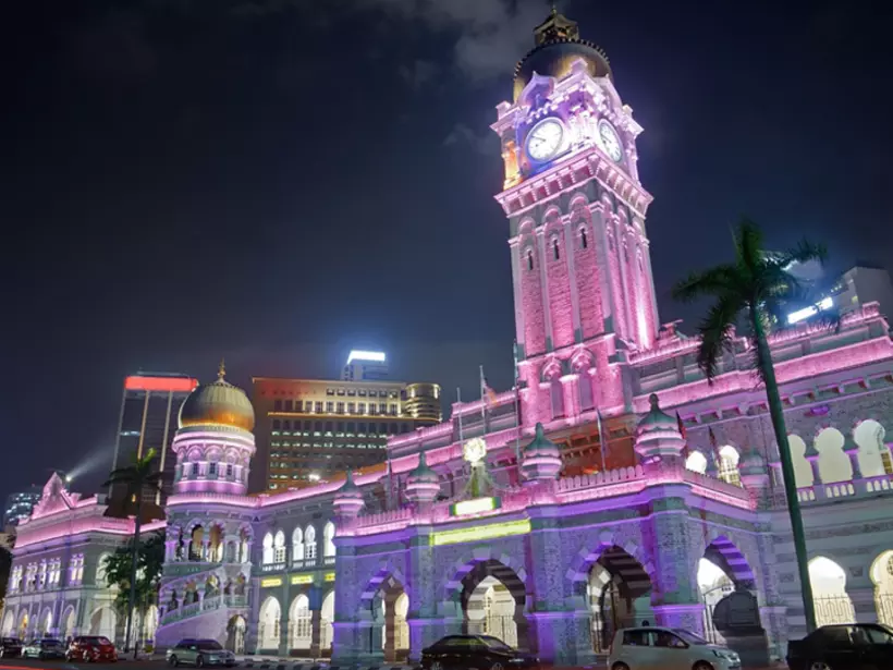 Colorful city night with famous landmark Sultan Abdul Samad Building