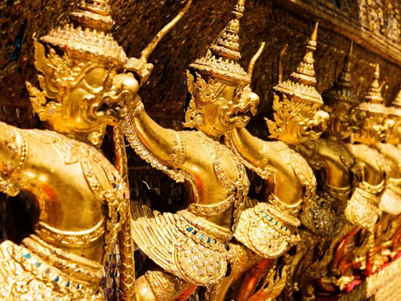 Golden Garuda sculptures at the Royal Palace