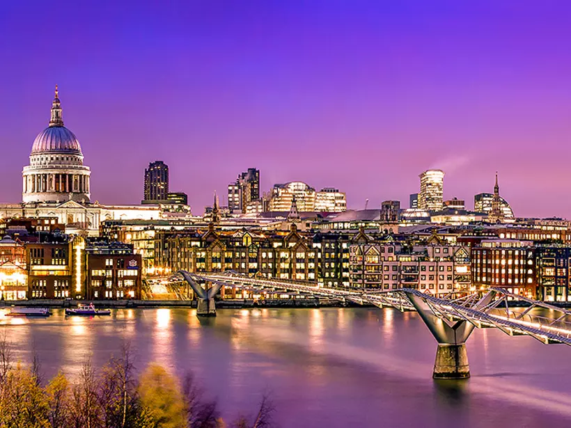 Cross over Millennium Bridge to tour St. Paul's Cathedral, sitting at the highest point in London