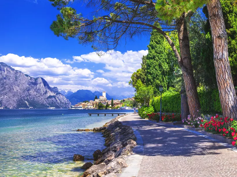 The shores of Lake Garda, the largest of the Italian lakes, are dotted with magnificent castles and delightful villas