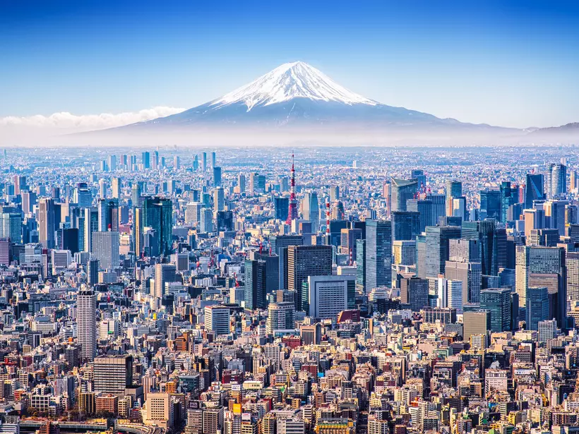 Tokyo, Japan Aerial view of Mount Fuji, Tokyo Tower and modern skyscrapers in Tokyo on a sunny day