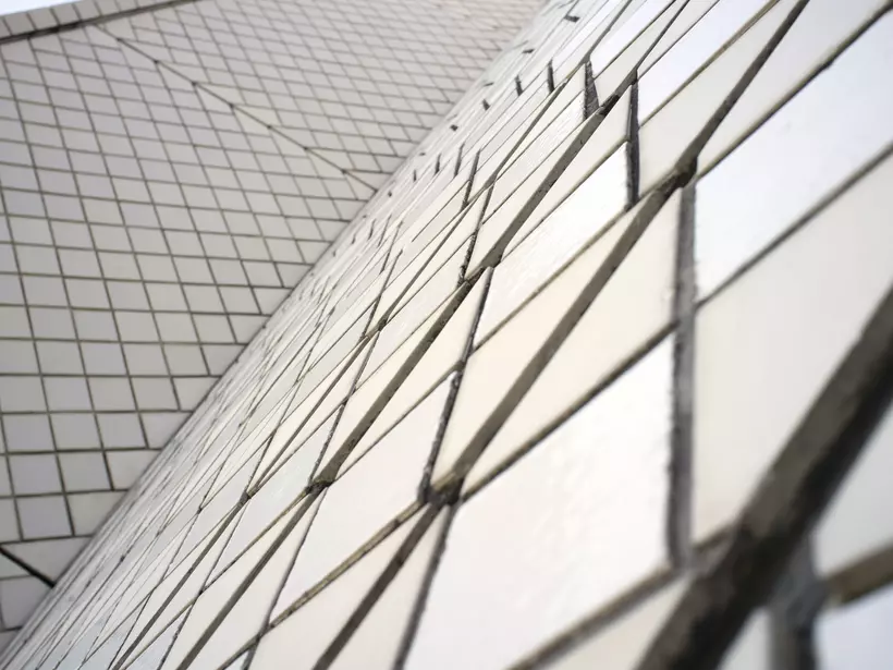 Detail of the ceramic tiles that clad the surface