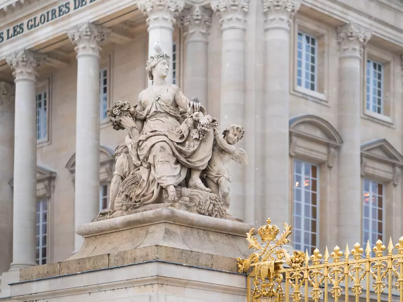 Statue at the entrance of Versailles Palace