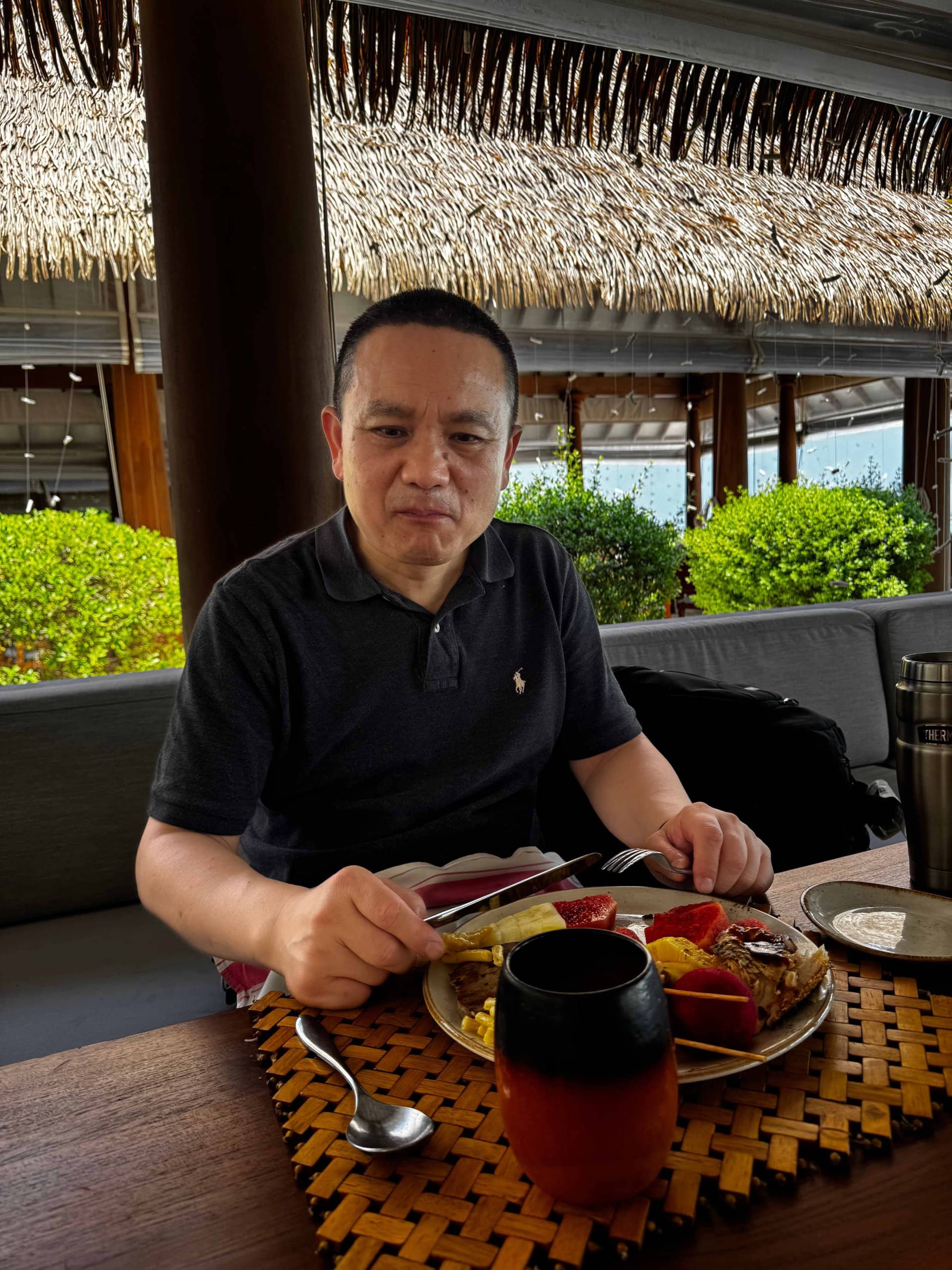 Peter Cheng eating a meal