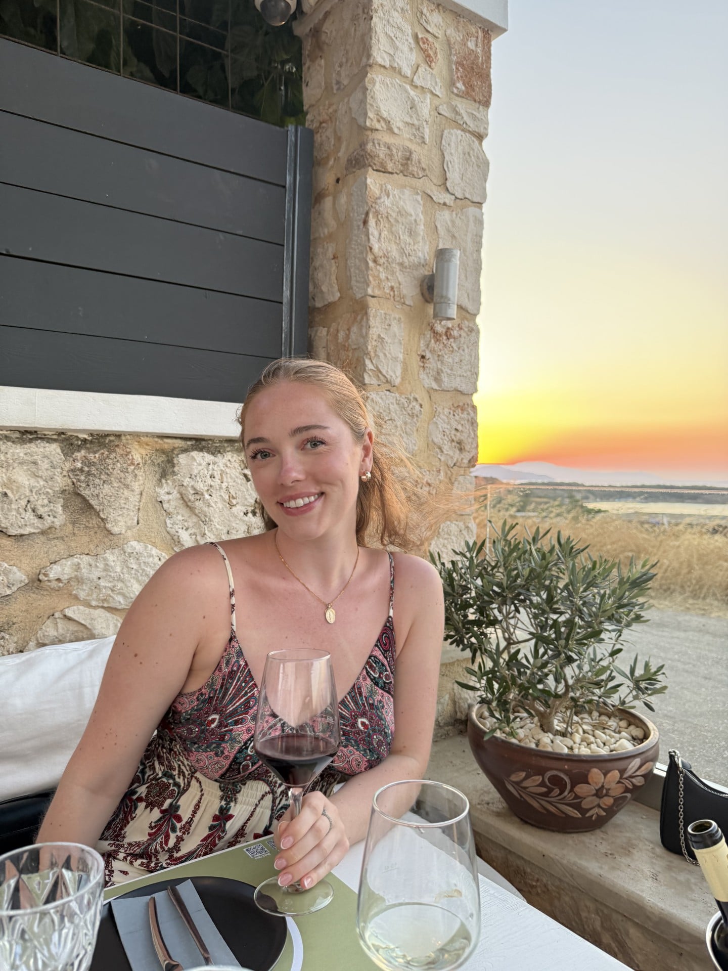 Phoebe Gould at dinner on vacation