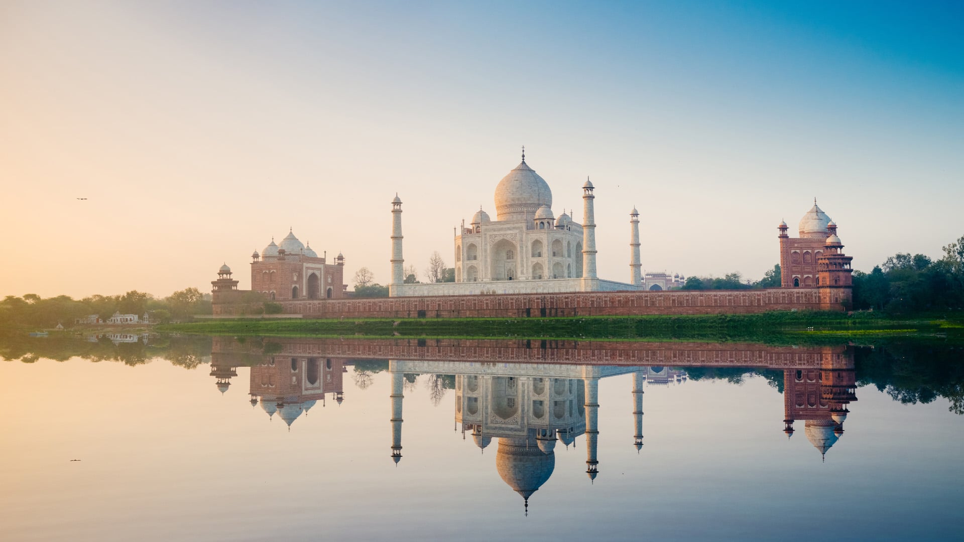 View of the Taj Mahal in Agra at sunrise.