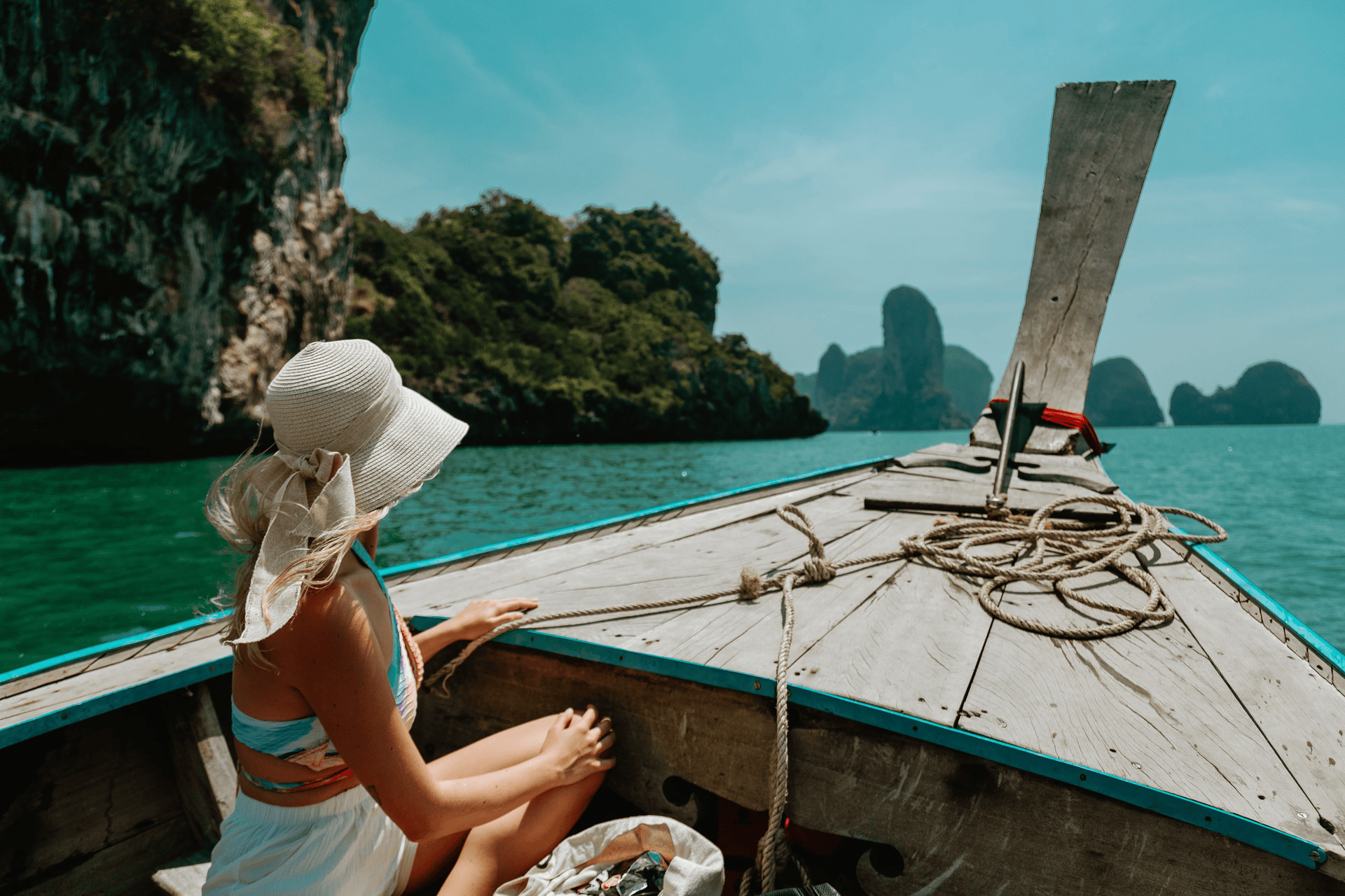Krabi, Thailand Woman in Thai boat in Krabi, Thailand