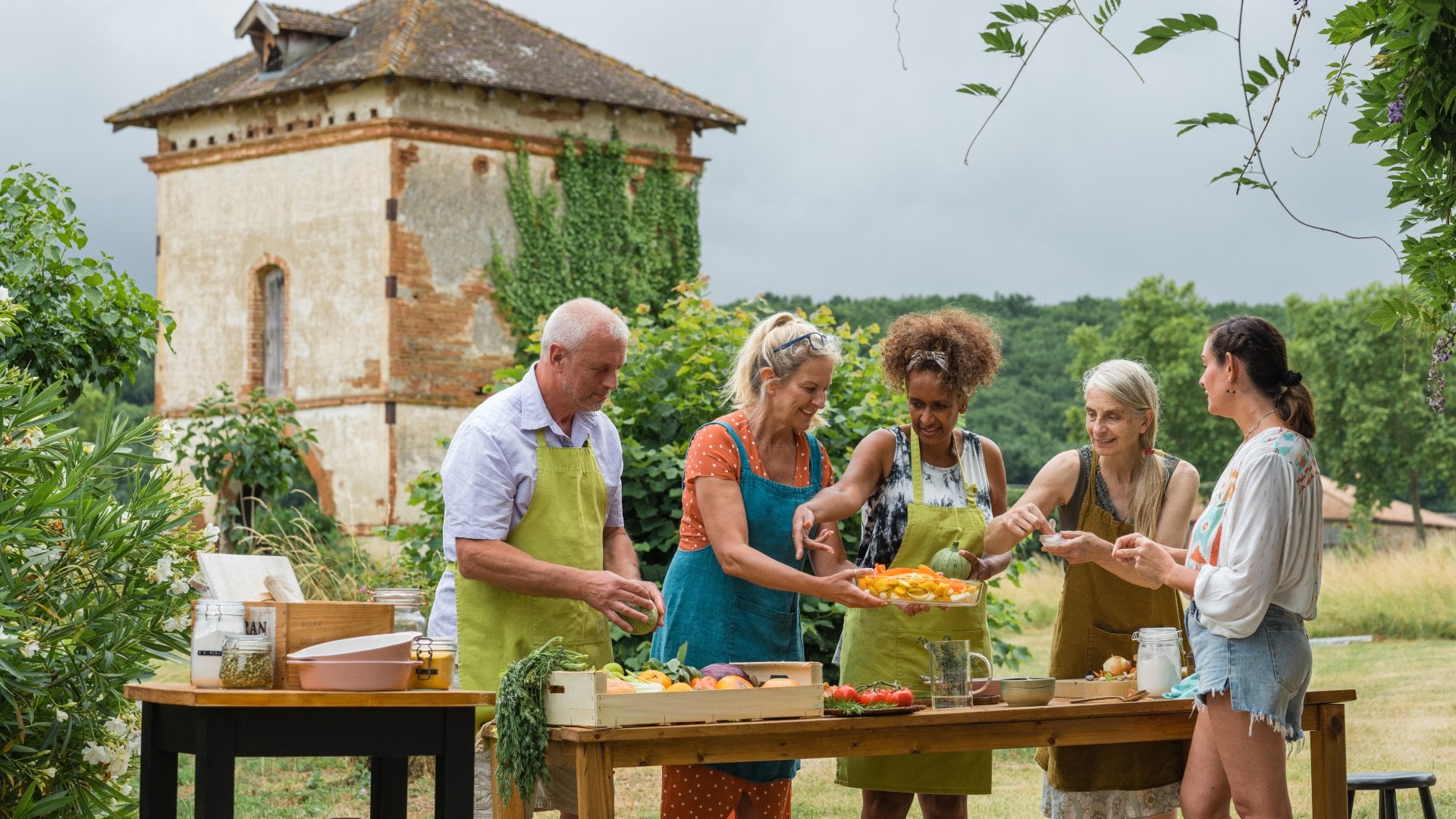 A group enjoying a cooking class experience while on holiday in Montauban, France