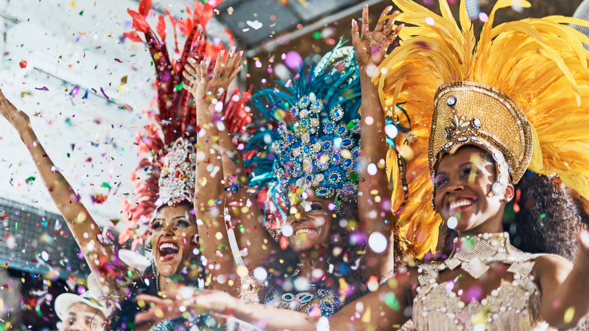 Cropped shot of samba dancers performing in Brazil carnival with their band
