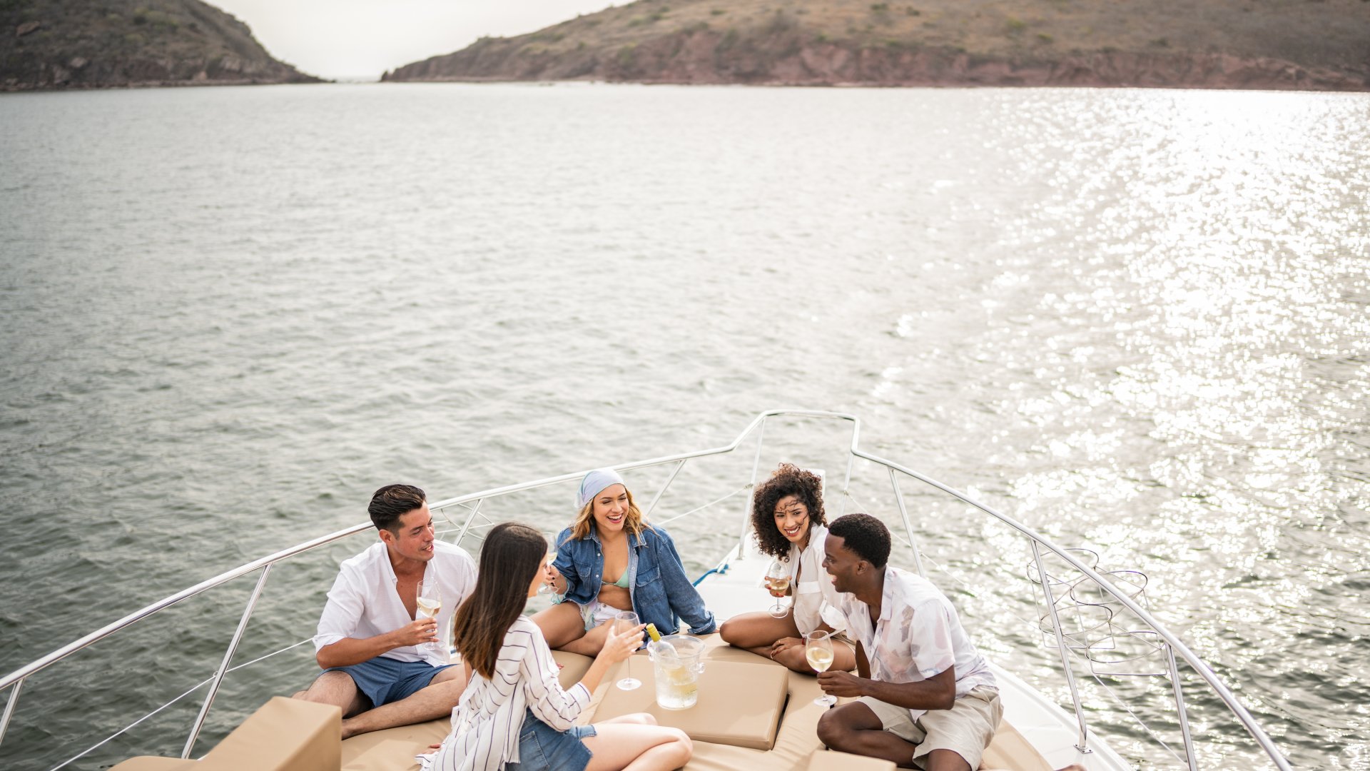 Friends gather on a luxury yacht