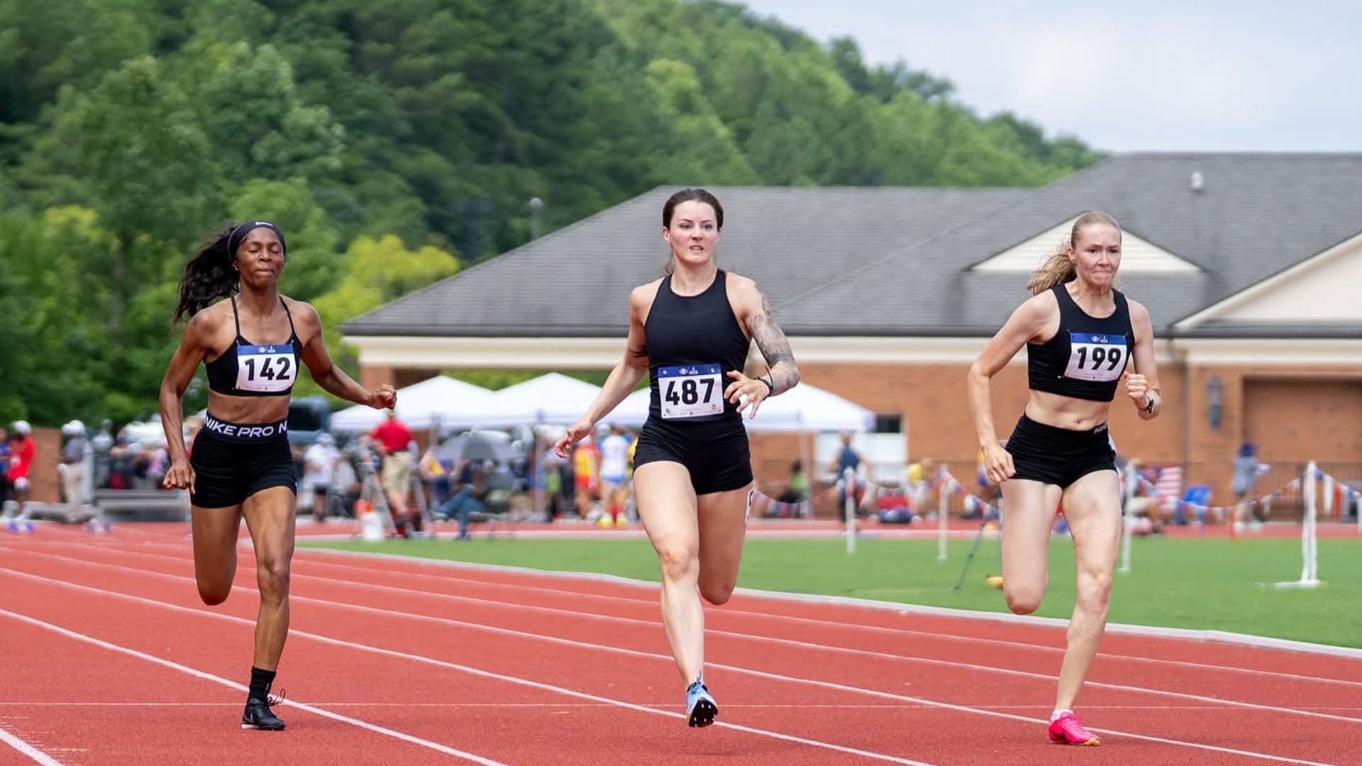 Three women racing in the World Police & Fire Games