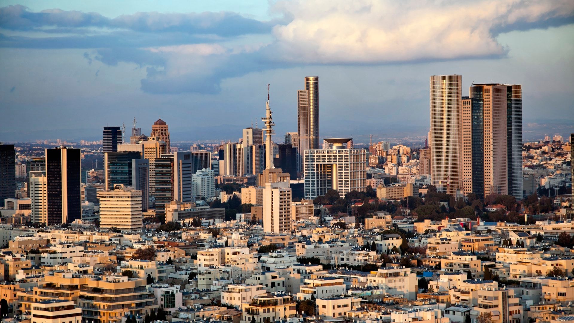 A view to the east, depicting the cityscape of downtown Tel-Aviv and its neighboring city Ramat-Gan at dusk. This is the central skyscraper area in the biggest metropolis in Israel.