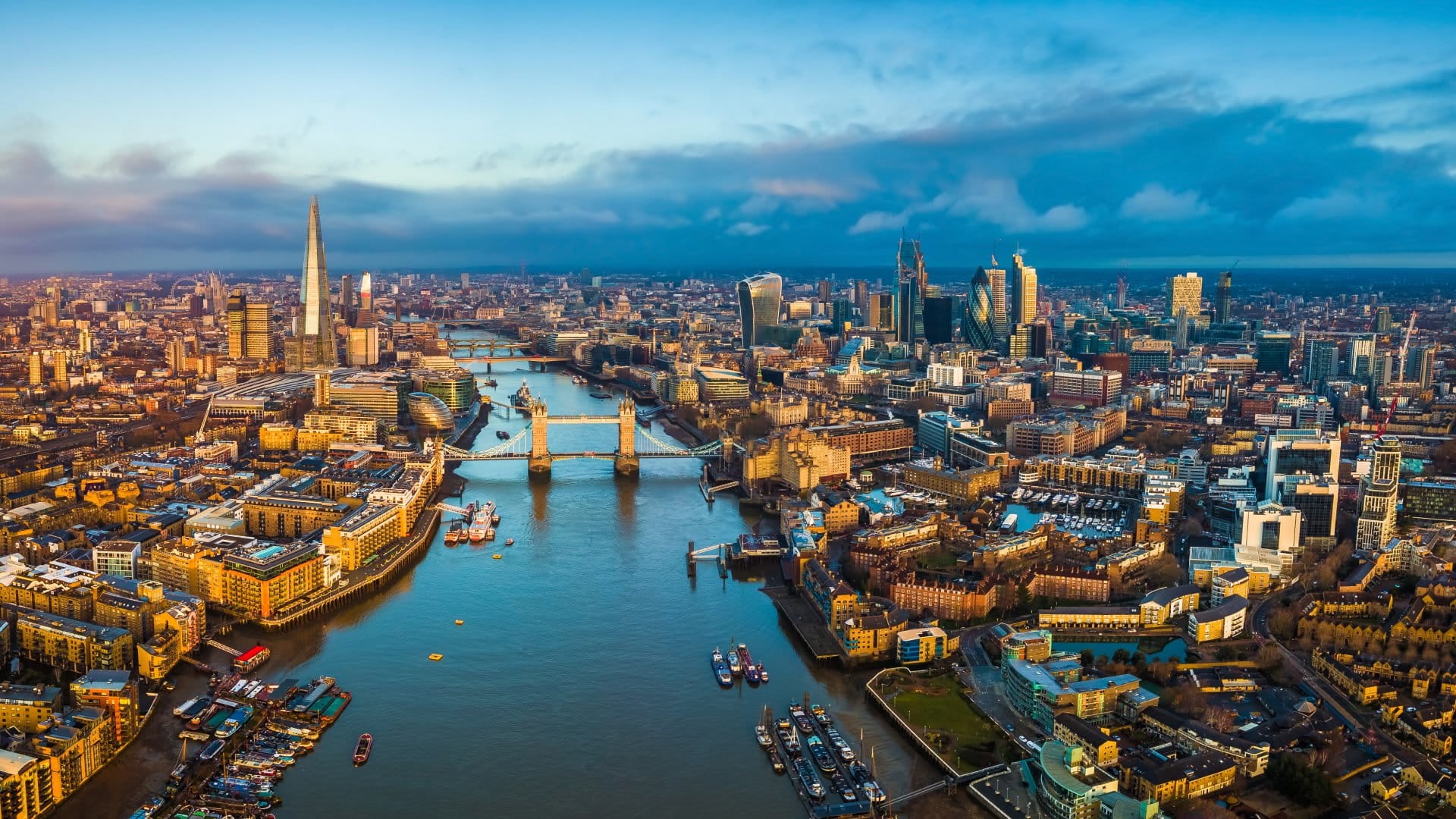 Aerial skyline view of London along the Thames at sunset, England UK United Kingdom