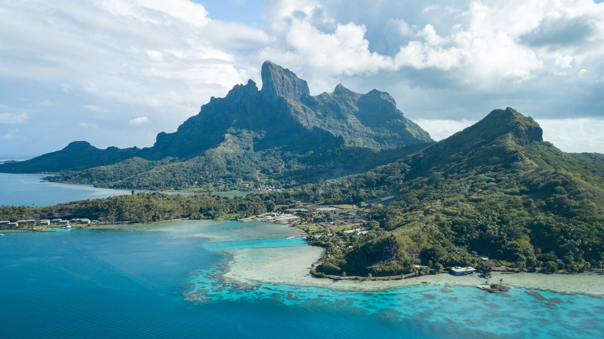 Aerial image from a drone of blue lagoon and Otemanu mountain at Bora Bora island, Tahiti, French Polynesia, South Pacific Ocean (Bora Bora Aerial)