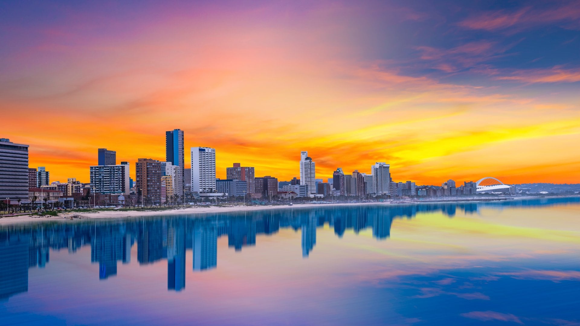Durban city beachfront skyline during summer with twilight sky in Kwazulu-Natal South Africa