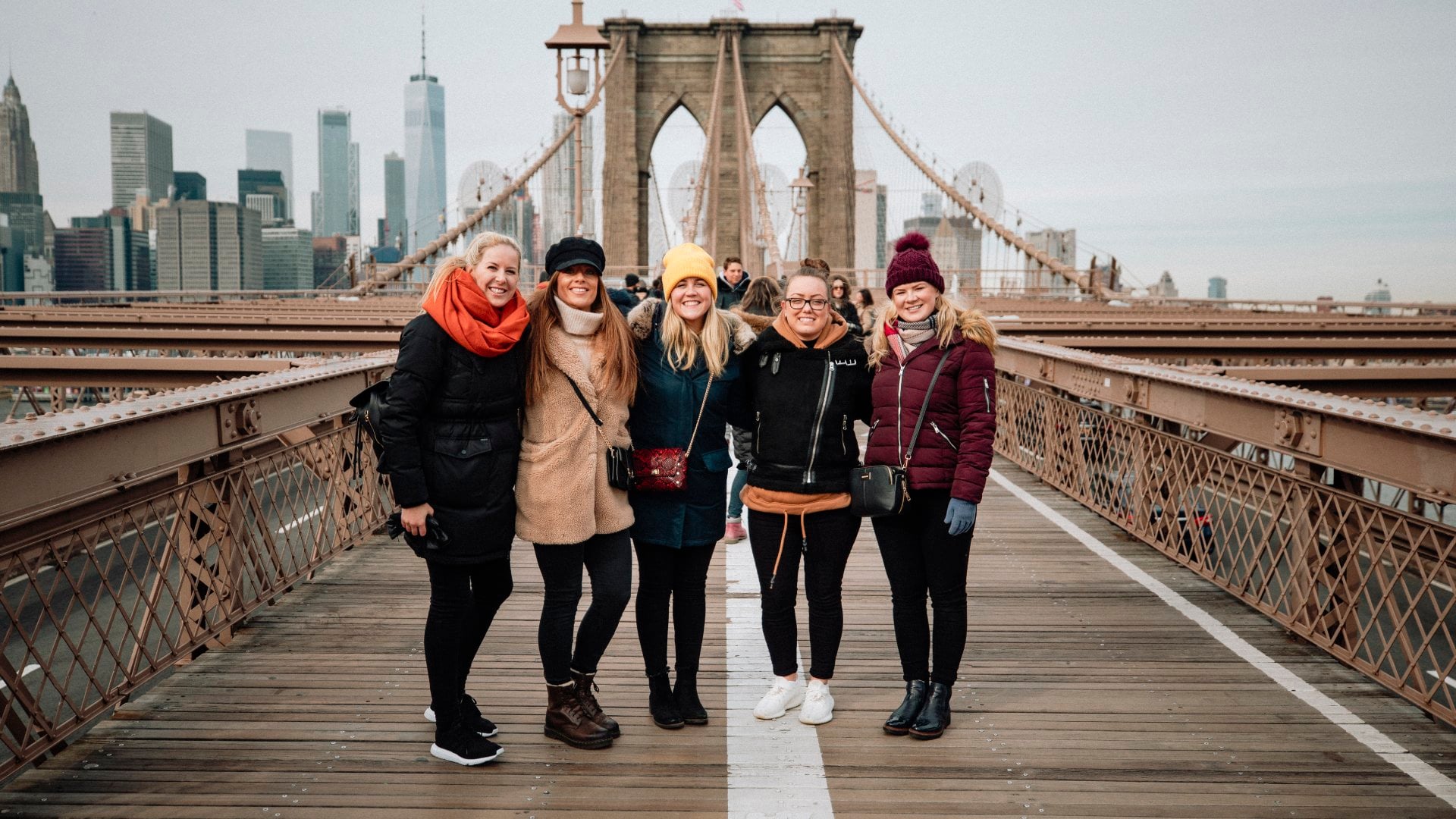 Group of tourist on Brooklyn Bridge