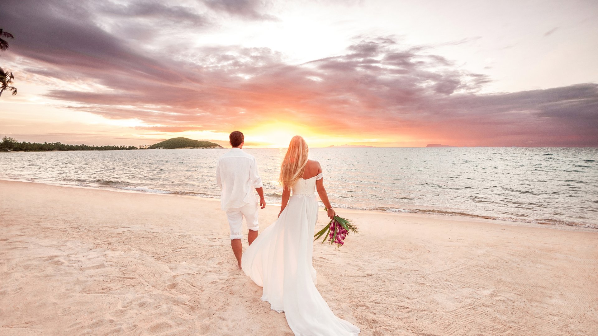 Newly married young couple by the sea, Thailand