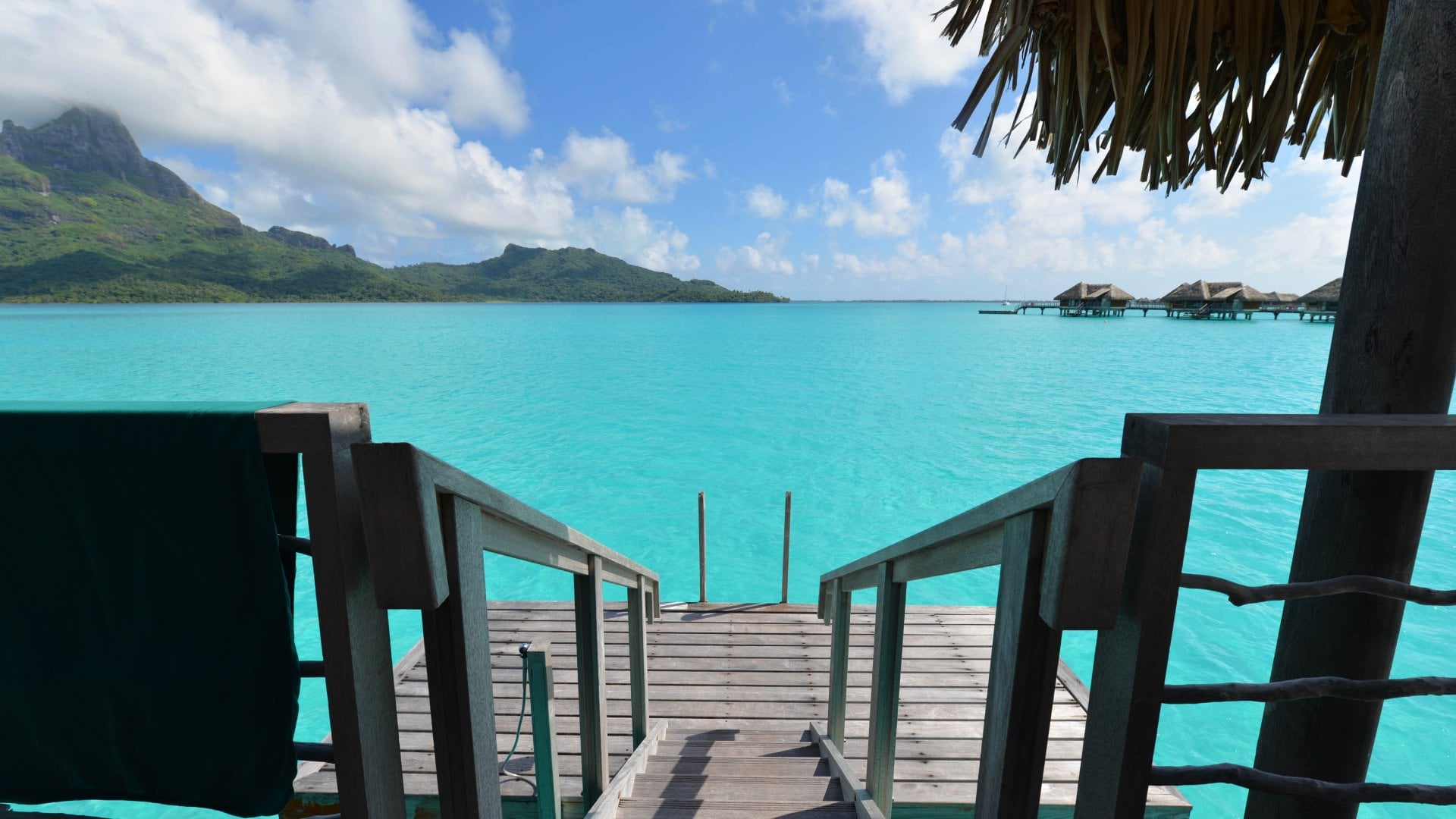 Overwater Bungalow view of Bora Bora's world class crystal clear lagoon in French Polynesia, South Pacific.