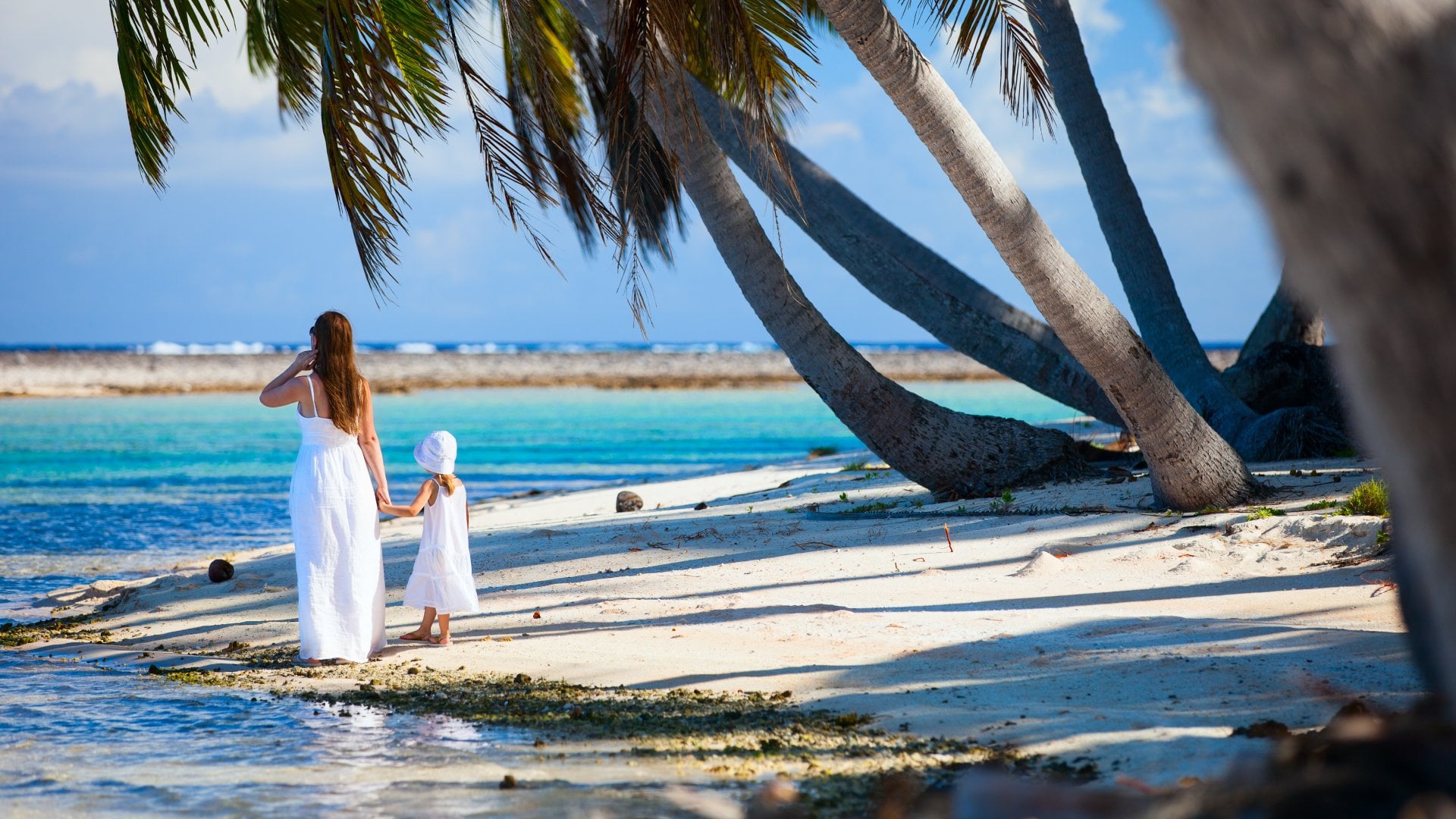 Mother and daughter on tropical vacation