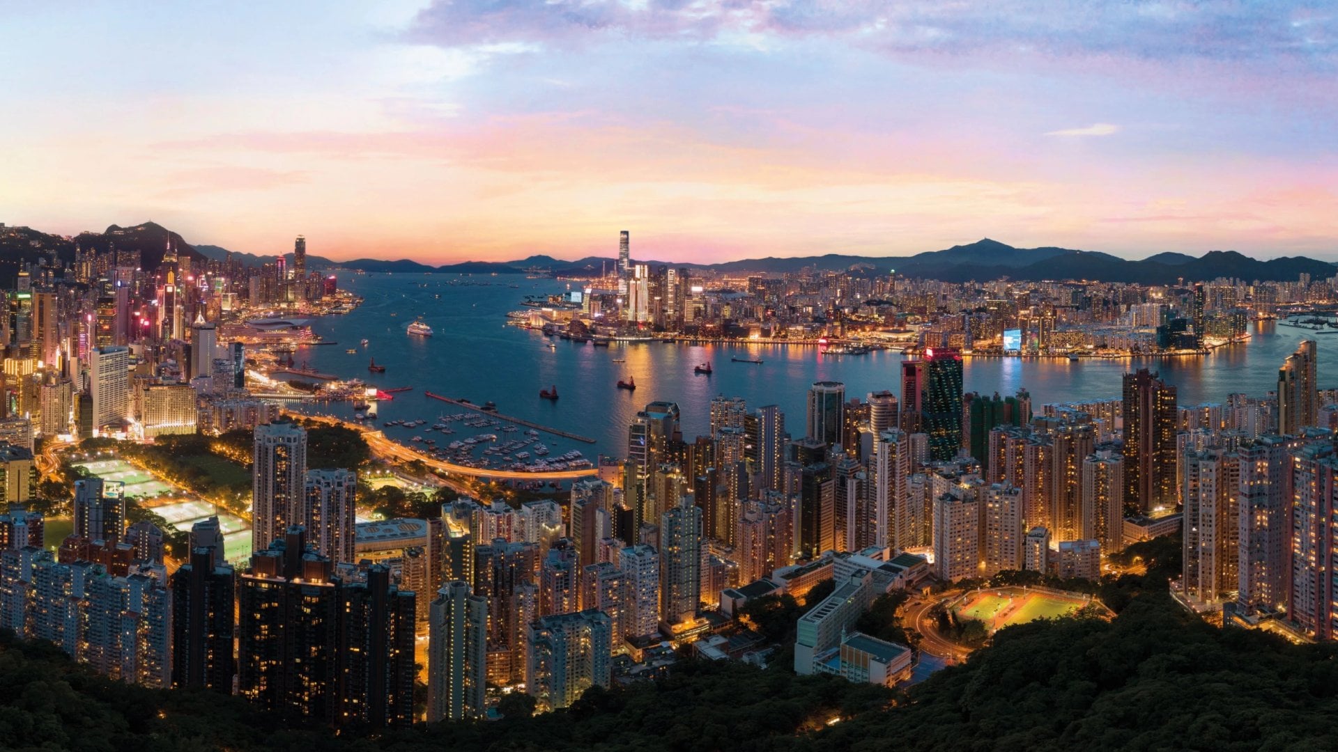 The skyline of Hong Kong creates an unforgettable panoramic view of the harbour and skyscrapers.