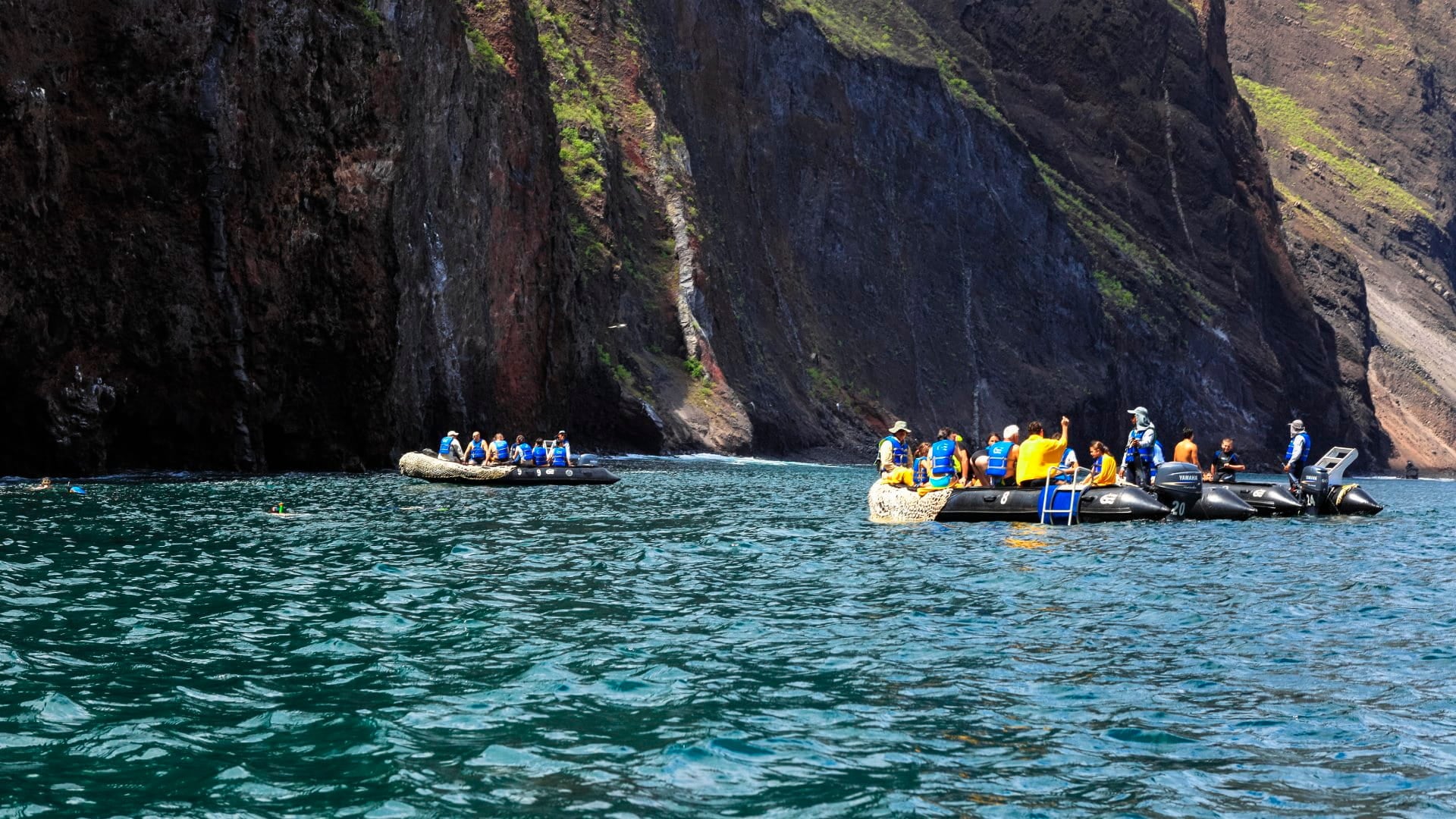 Tourists aboard inflatable boats in the Galápagos Islands, Ecuador.
