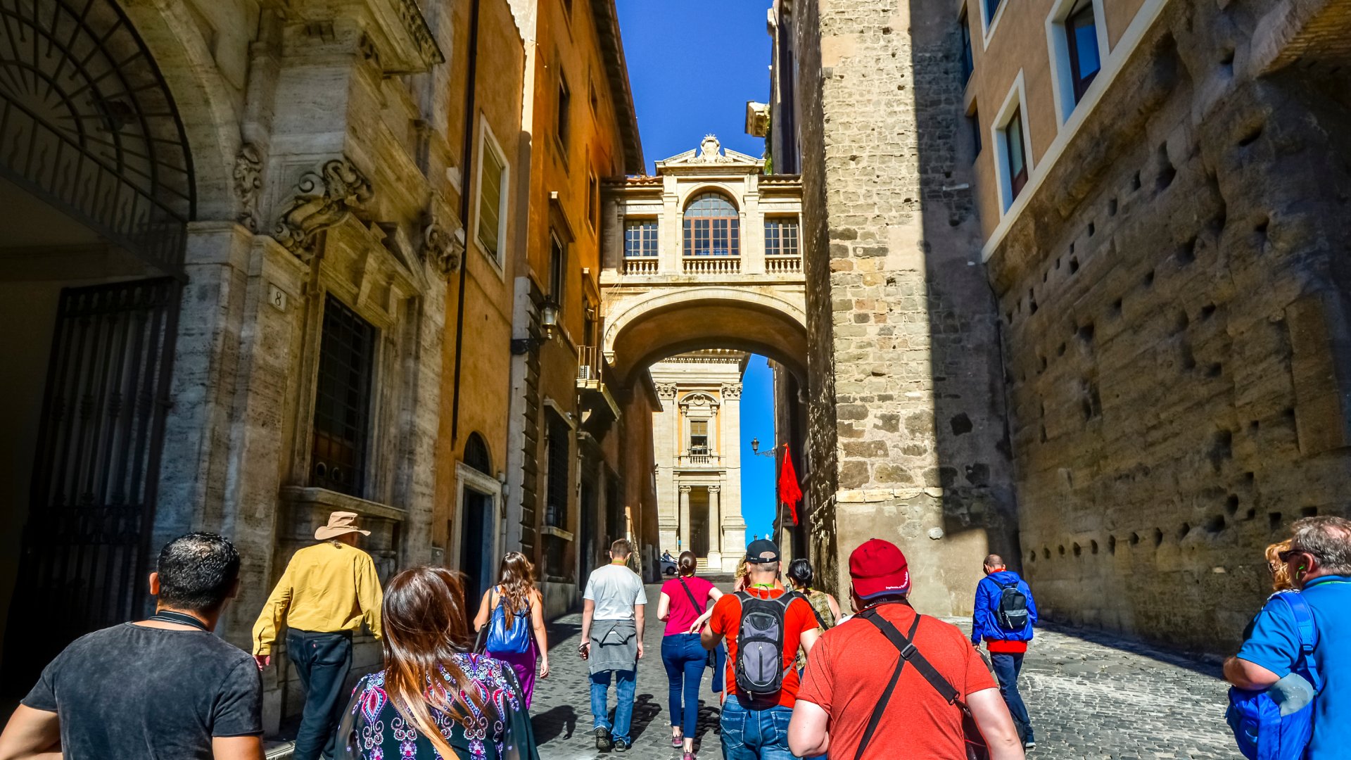 a group of travellers on a european city street