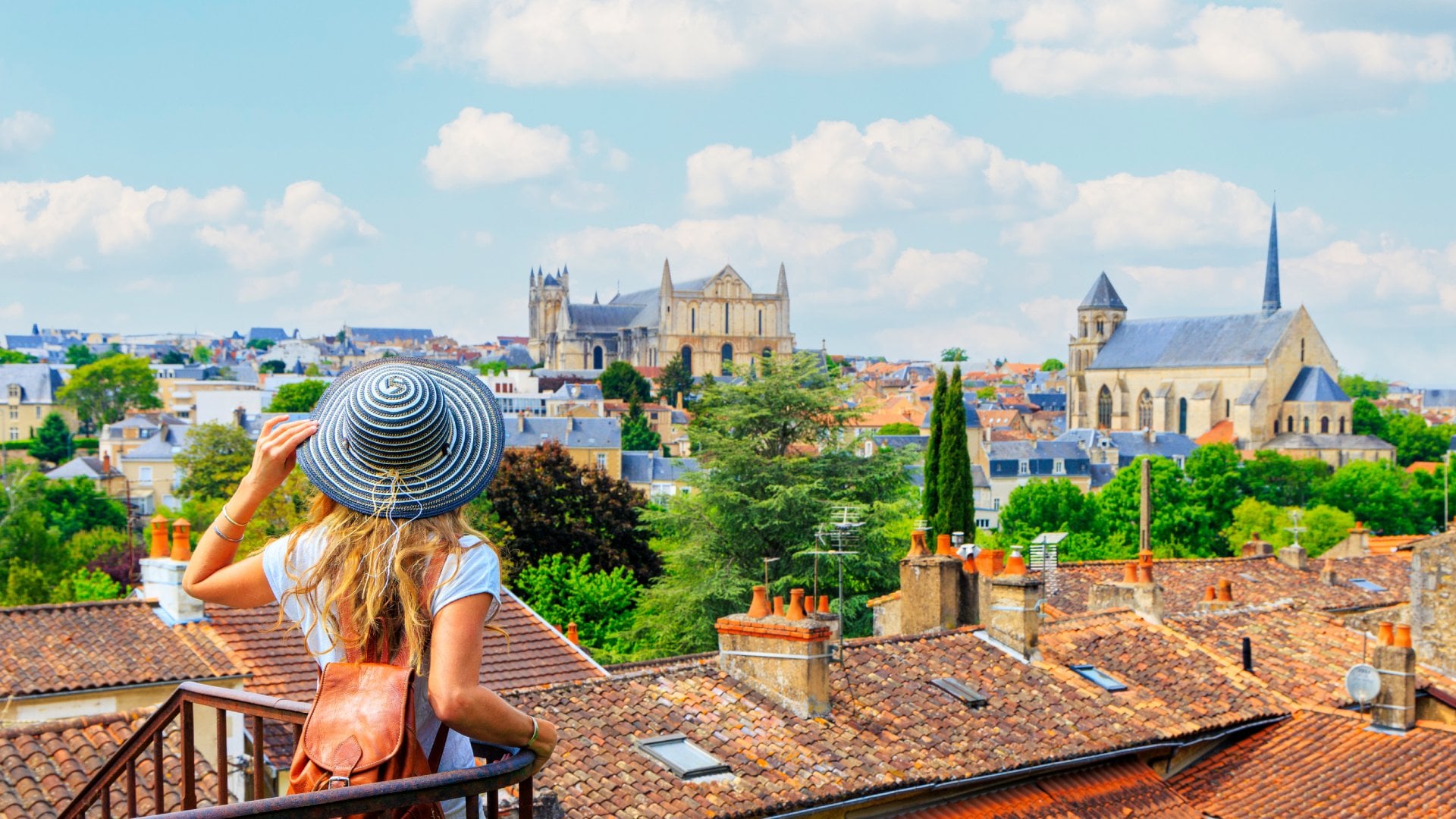 Poitiers, France Poitiers city landscape- Woman looking at urban skyline- France