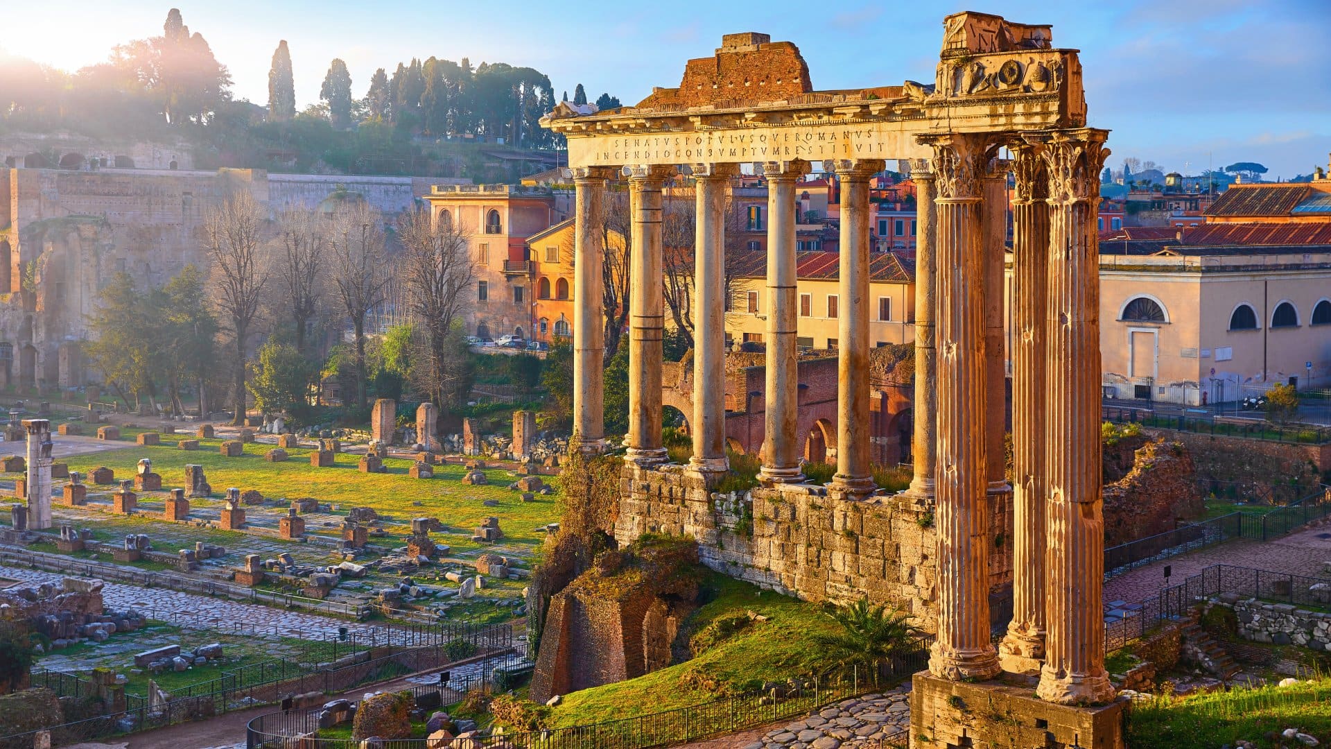 ancient columns in ruins within modern city centre
