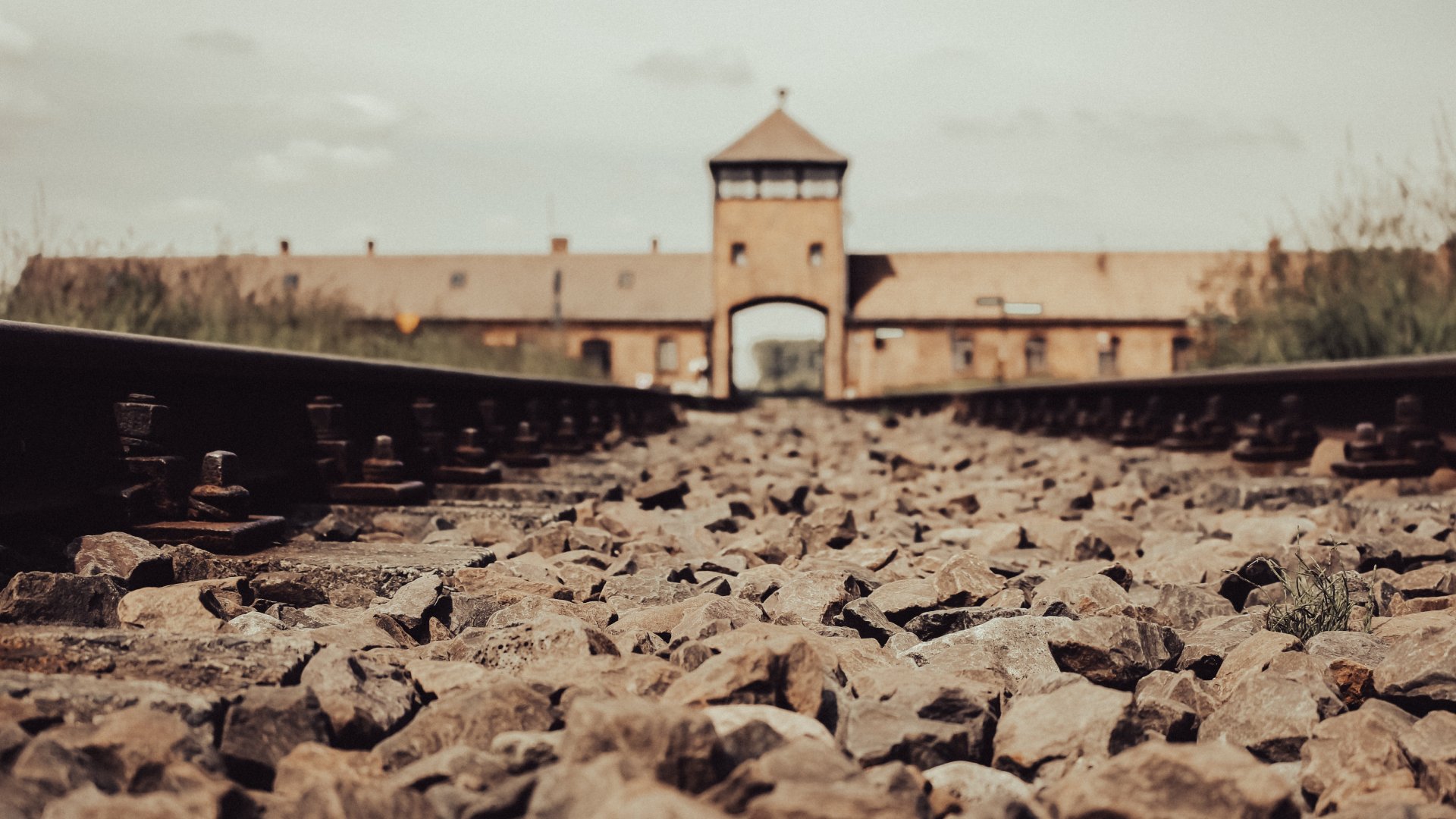 Gate to concentration camp Auschwitz, Oswiecim. Rail entrance to Auschwitz. Holocaust memorial.