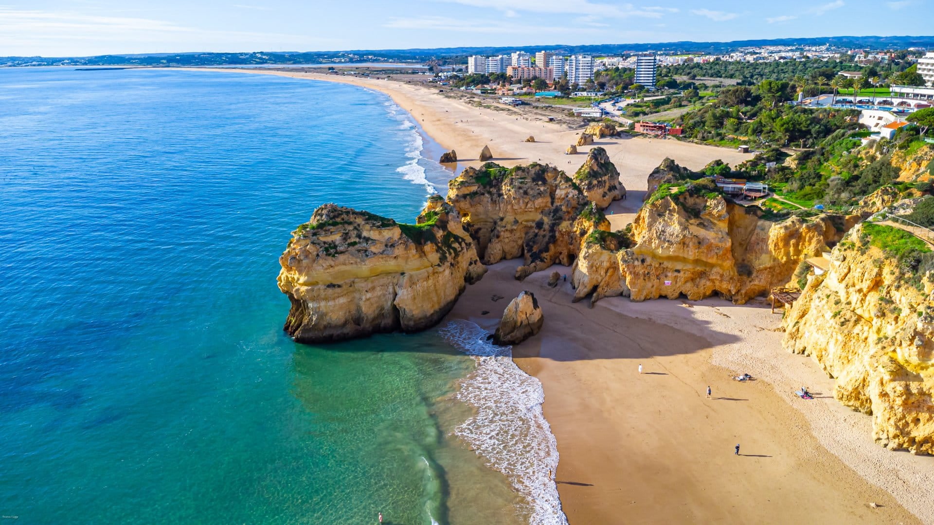 An aerial view of the rocks and beaches of Alvor in the Algarve, Portugal