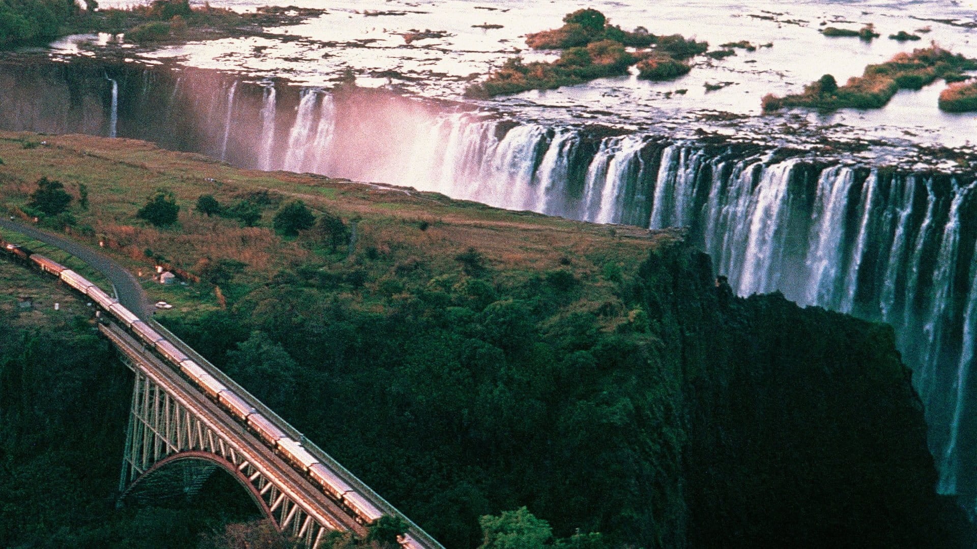 Aerial view of the Rovos Rail train heading alongside Victoria Falls in Zimbabwe