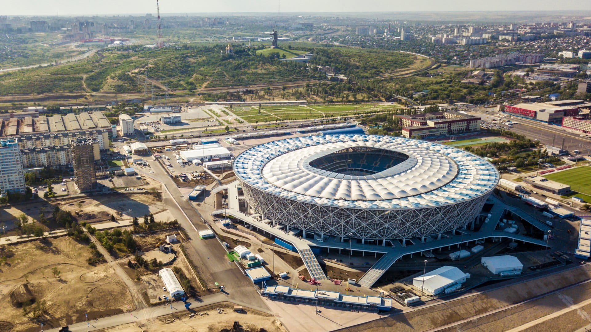 aerial view of football stadium on edge of city