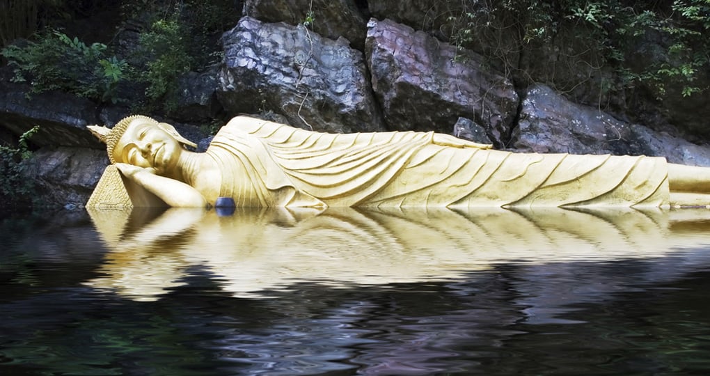 A reclining Buddha on a nearby mountaintop A reclining Buddha on a nearby mountaintop