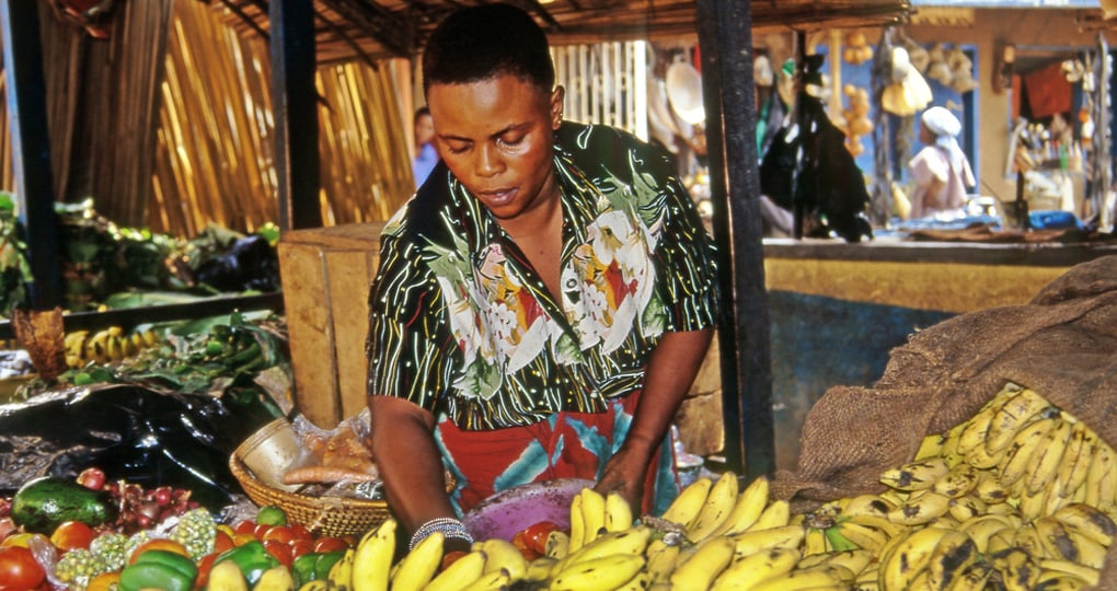 A vendor in the markets of Kampala A vendor in the markets of Kampala