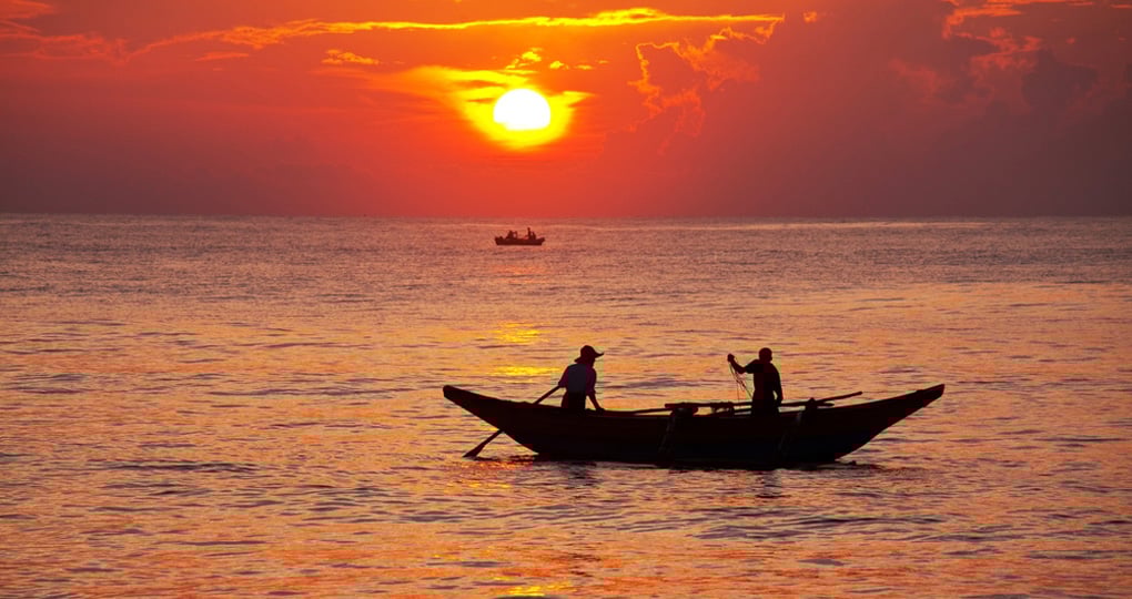 A fishing boat at sunset A fishing boat at sunset