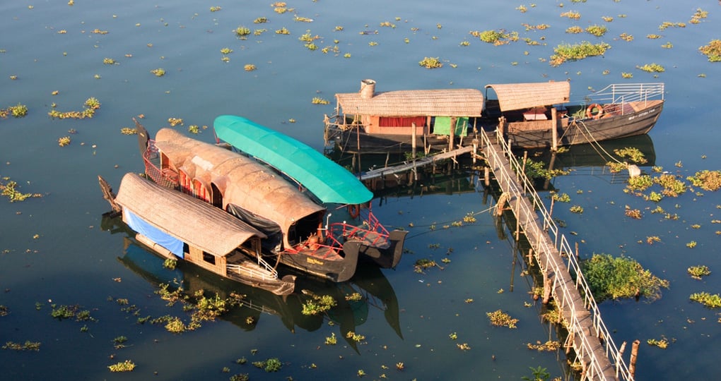 Kerala Houseboats moored near Cochin backwaters Kerala Houseboats moored near Cochin backwaters