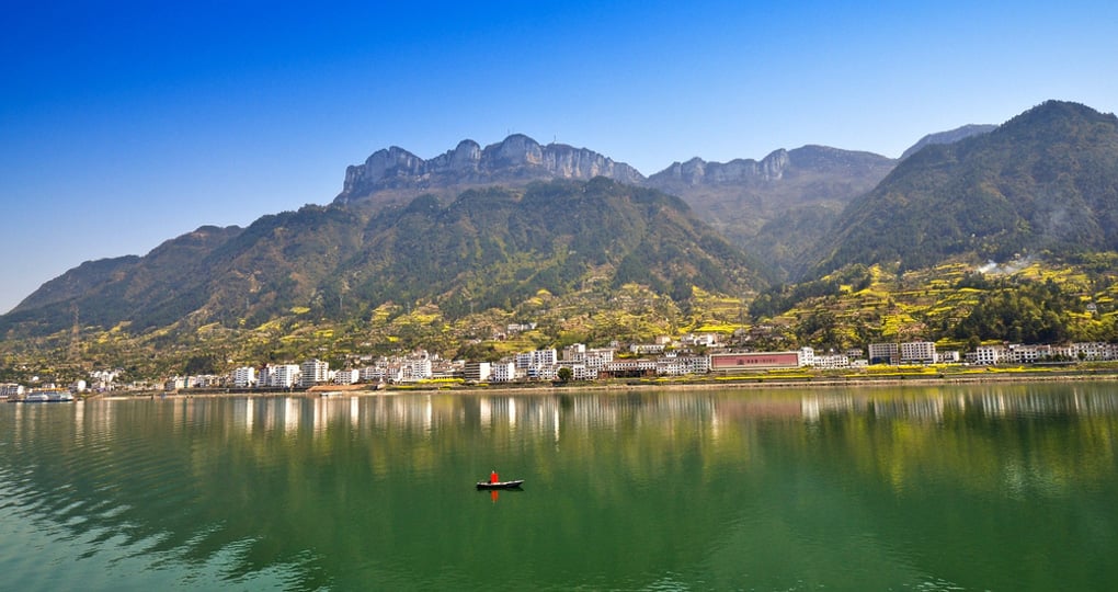 A panoramic view of the town and river A panoramic view of the town and river