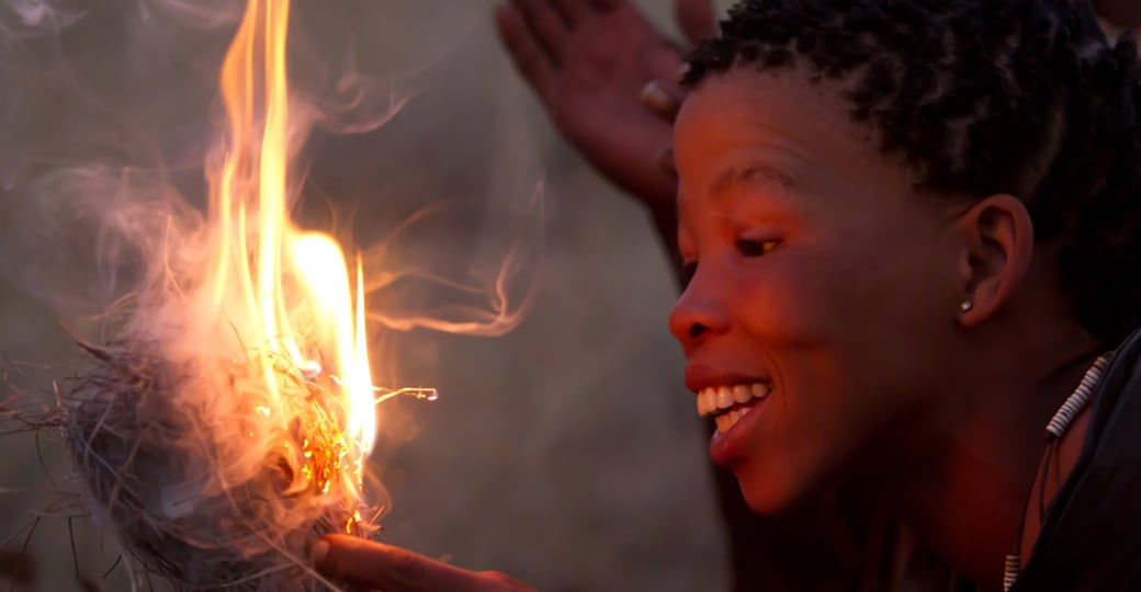 A women making fire as seen while travelling on your Serengeti National Park safari. A women making fire as seen while travelling on your Serengeti National Park safari.
