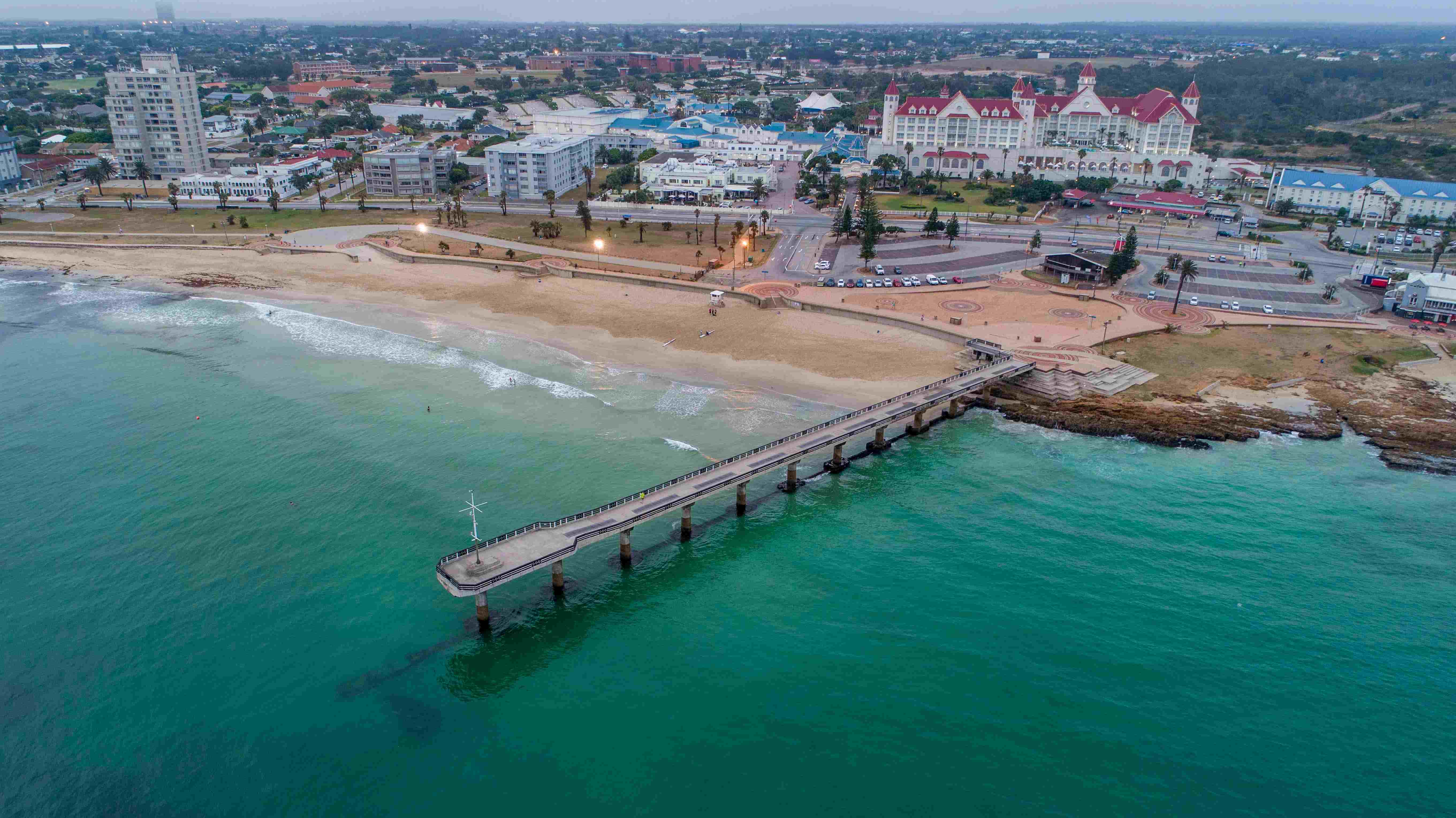 Shark Rock Pier Aerial view of Shark Rock Pier in Port Elizabeth, South Africa. The pier juts out into Algoa Bay, with the city skyline in the background.