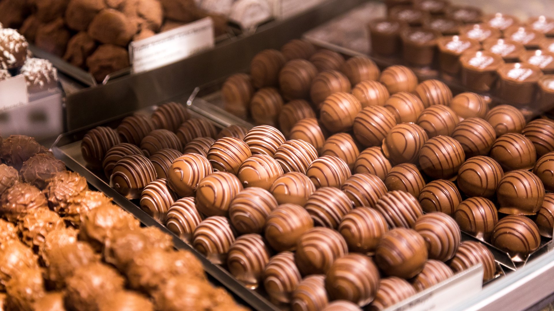 Swizerland Depicting a selection of fresh Swiss chocolates and truffles on display inside a Swiss chocolate store