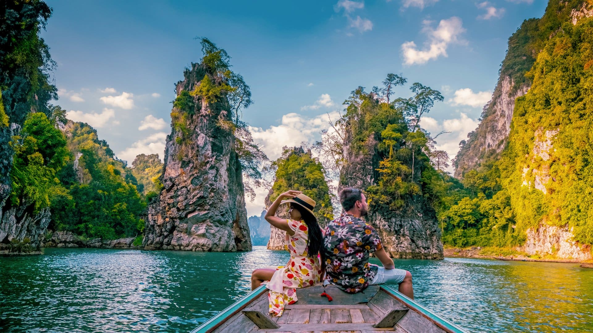 In Khao Sok National Park in Thailand you can boat among towering lime stone cliffs